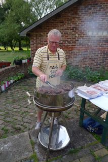 Phil Freeman of Rega doing up some BBQ at Roy Gandy's house.
